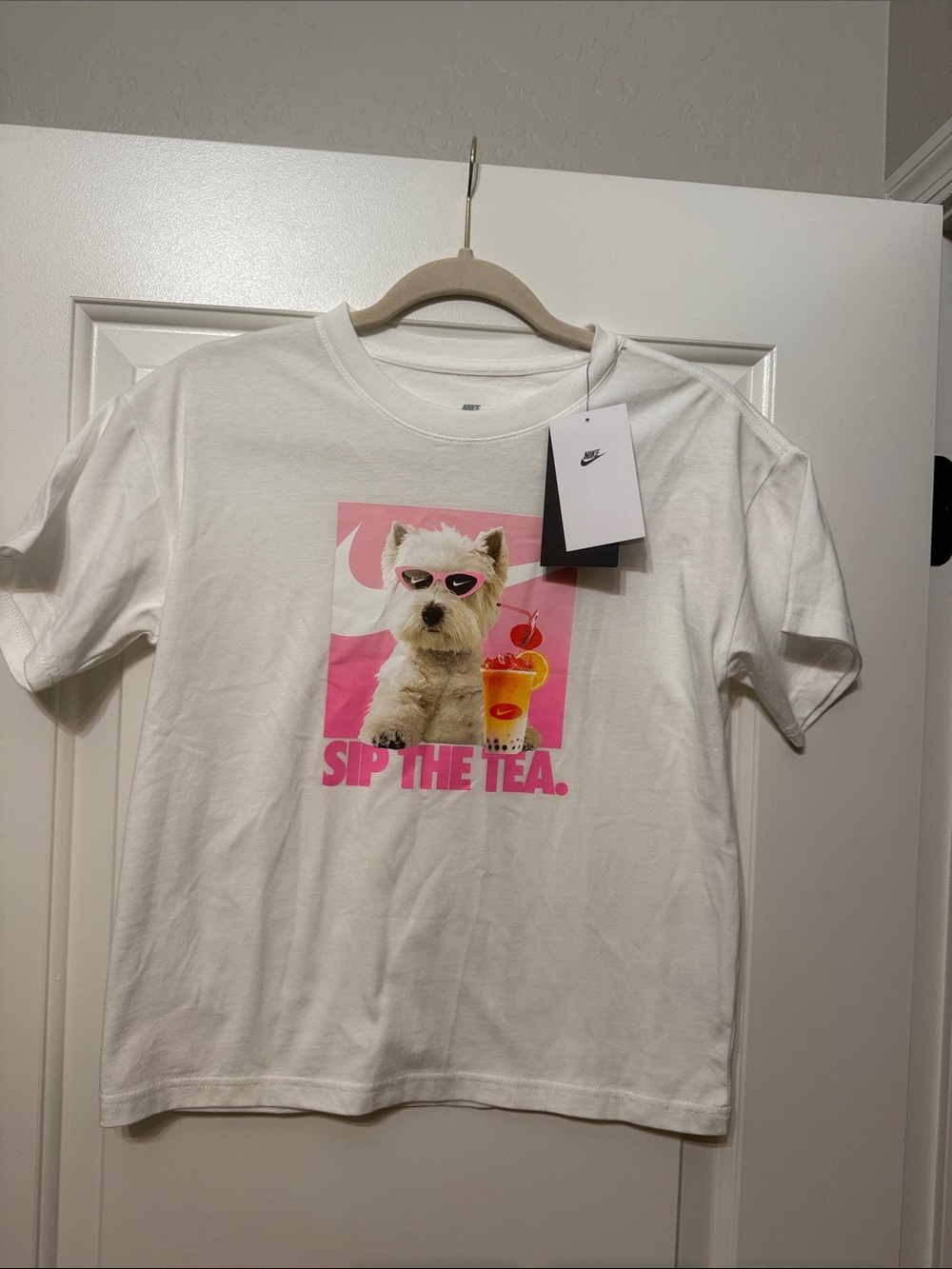 Nike White Kids Graphic Tee with Pink Dog & Drink Print
